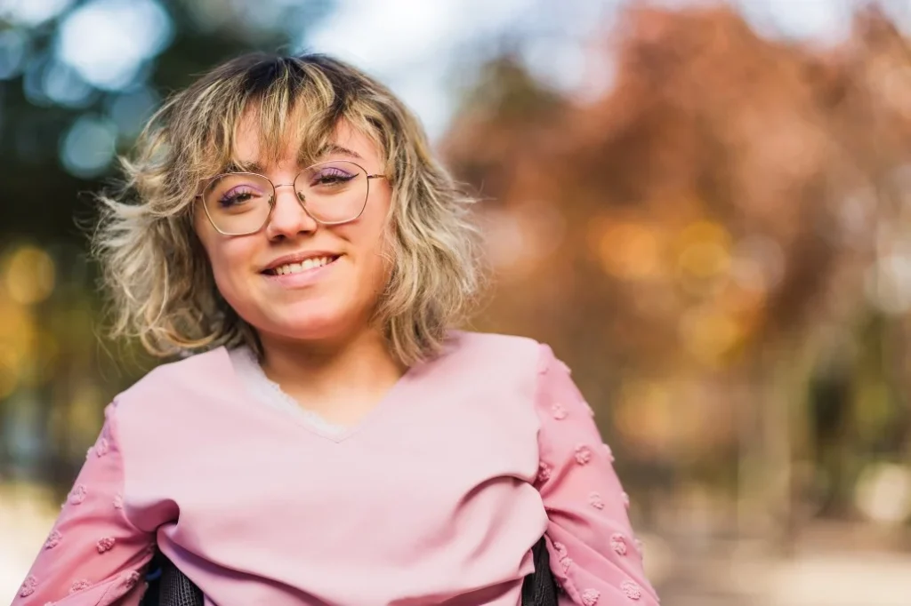 Disabled woman smiling at camera